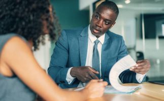 Business people having discussion for new agreement, in the office Business people having discussion for new agreement, in the office